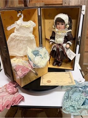 Porcelain Collector Doll in Original Travel Case with 4 Outfits and Accessories